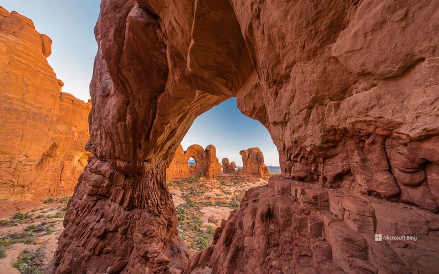 Double Arch seen through Cove Arch, Arches National Park, Utah, USA