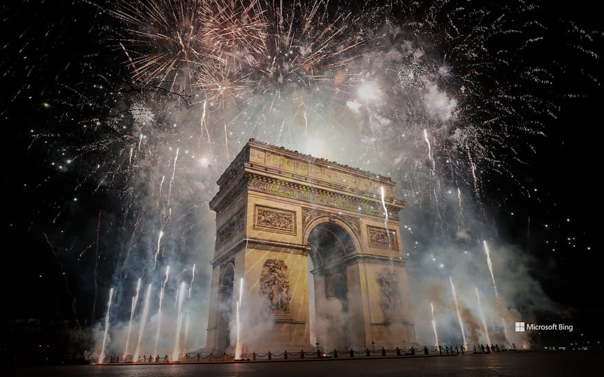 Arc de Triomphe under fireworks, Paris