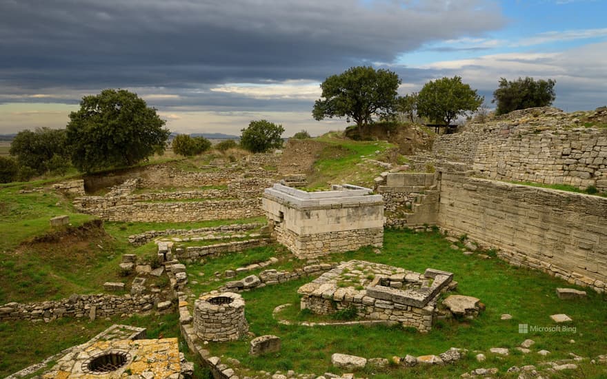 Sanctuary walls and fountain of Troy VI in the archaeological site at Hisarlık, Turkey